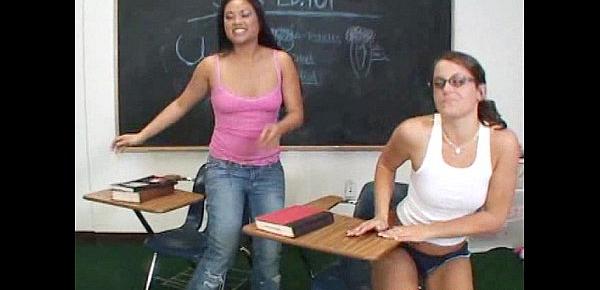  Horny Ashley Marie fucks Savannah Stern in the classroom with a strap on dildo
